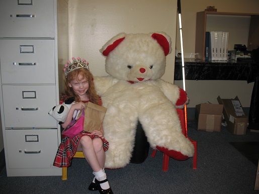 A little girl and the Christmas Teddy Bear